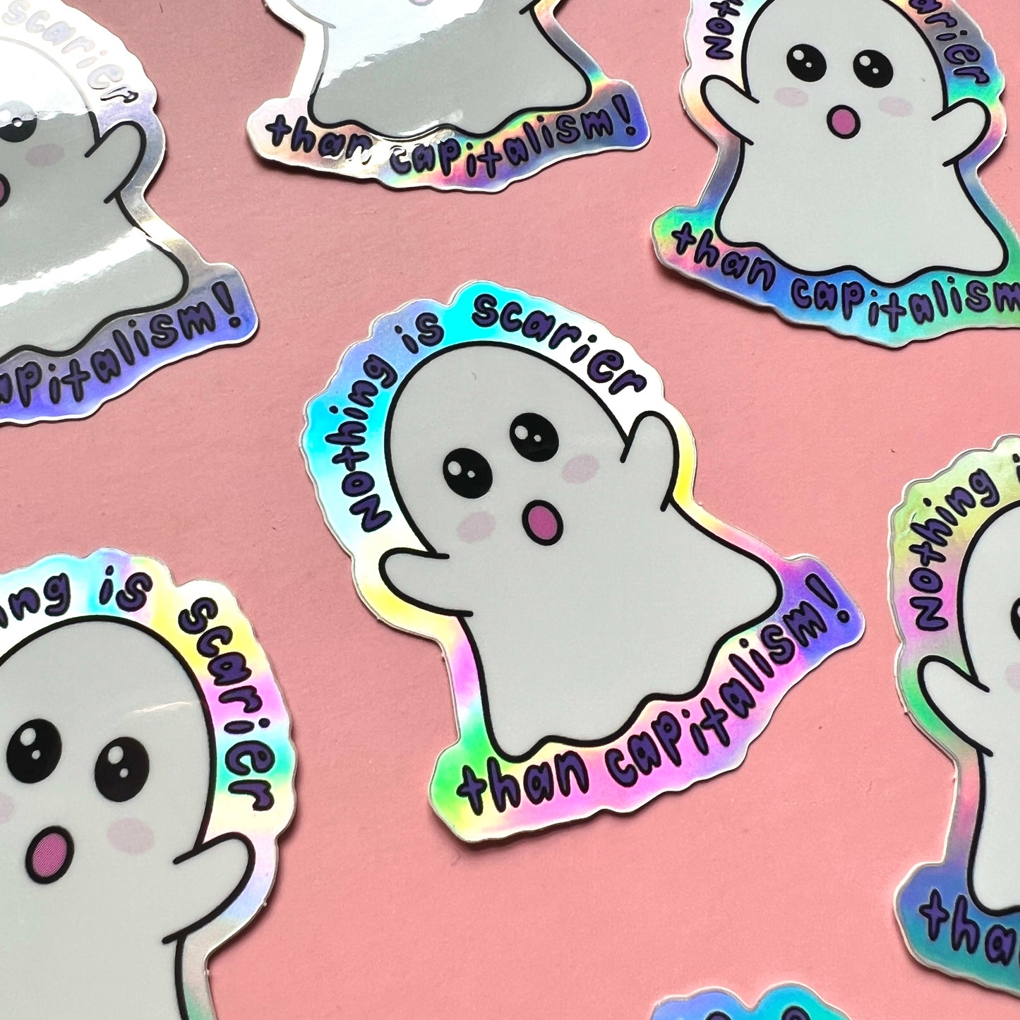"nothing is scarier than capitalism" holographic ghost sticker