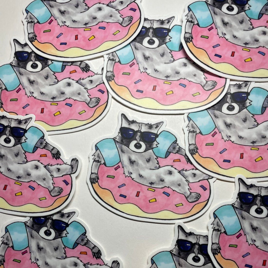 Raccoon Donut Float Sticker
