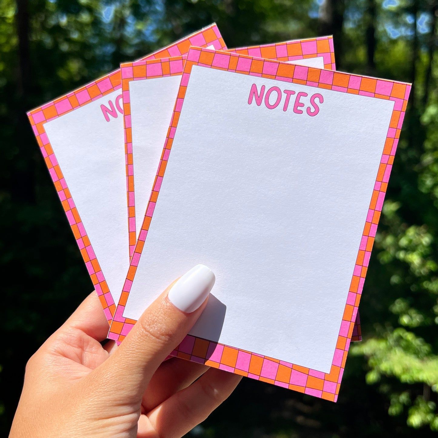 pink + orange checkered notepad