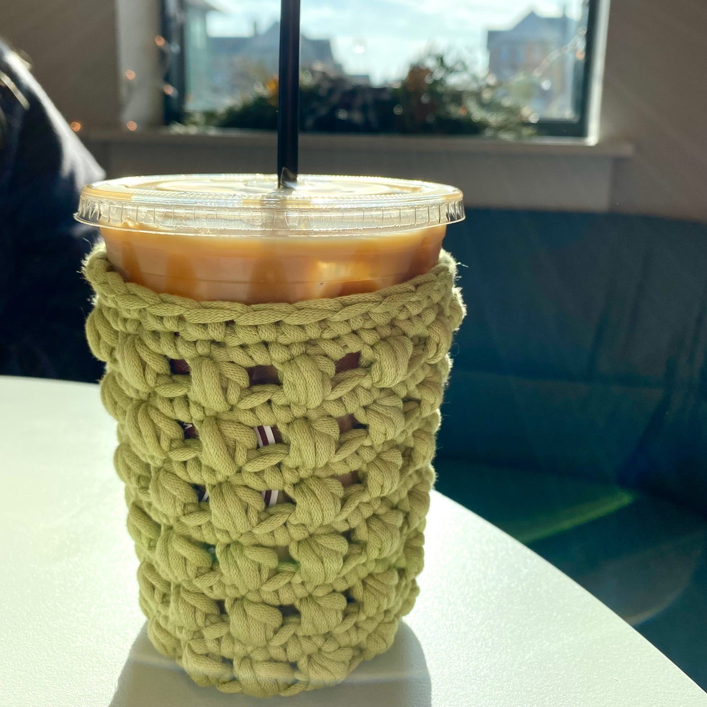 green iced coffee cozy. beverage koozie.