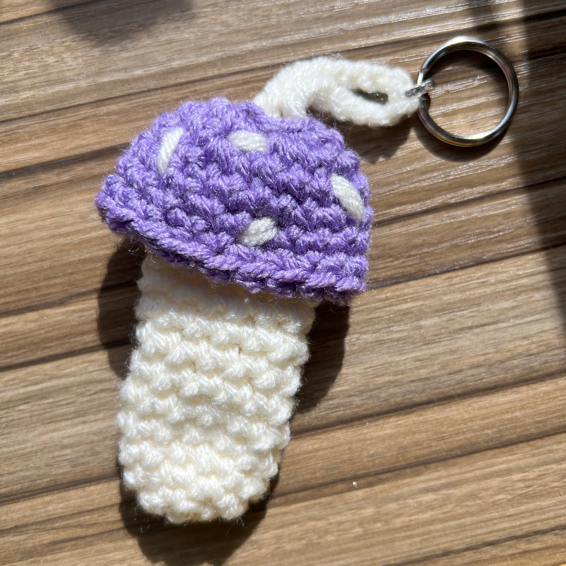 purple and white mushroom keychain for storing items like money, chapstick, crystals, lighters, & tampons