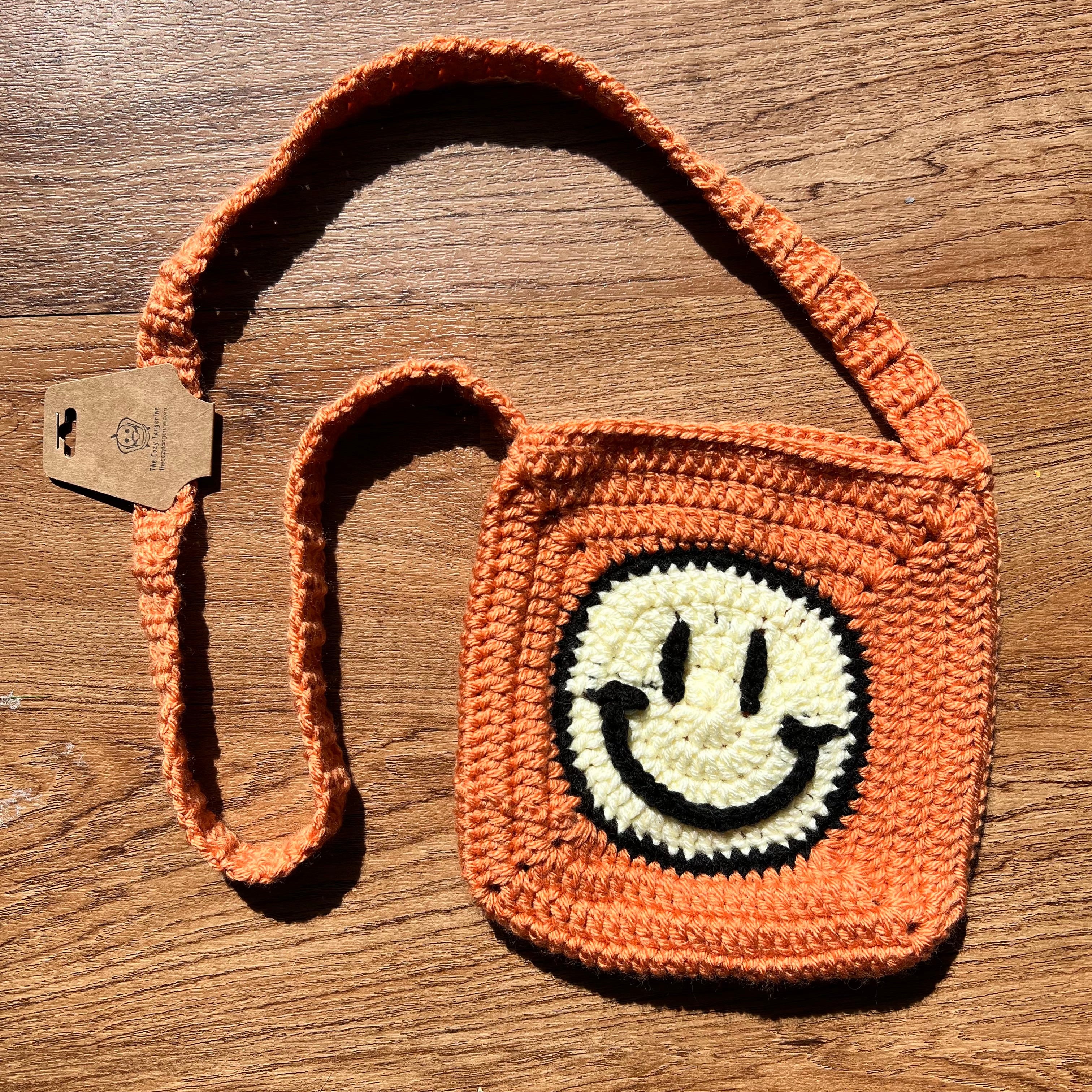 Smiley face best sale cross body bag